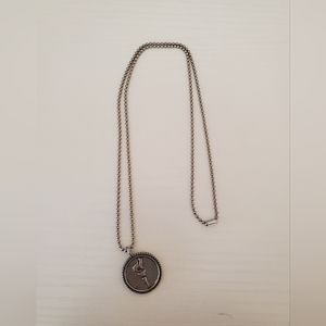 Silver torch necklace